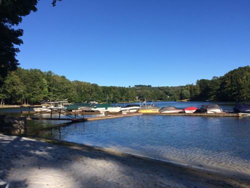 The common property includes picnic tables, grill, kayak and canoe racks, and a limited number of boat slips. 